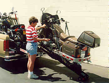 One Young Gal Loading Full Dresser into Pickup!